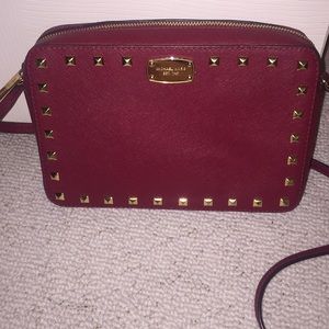 Red studded Michael Kors crossbody